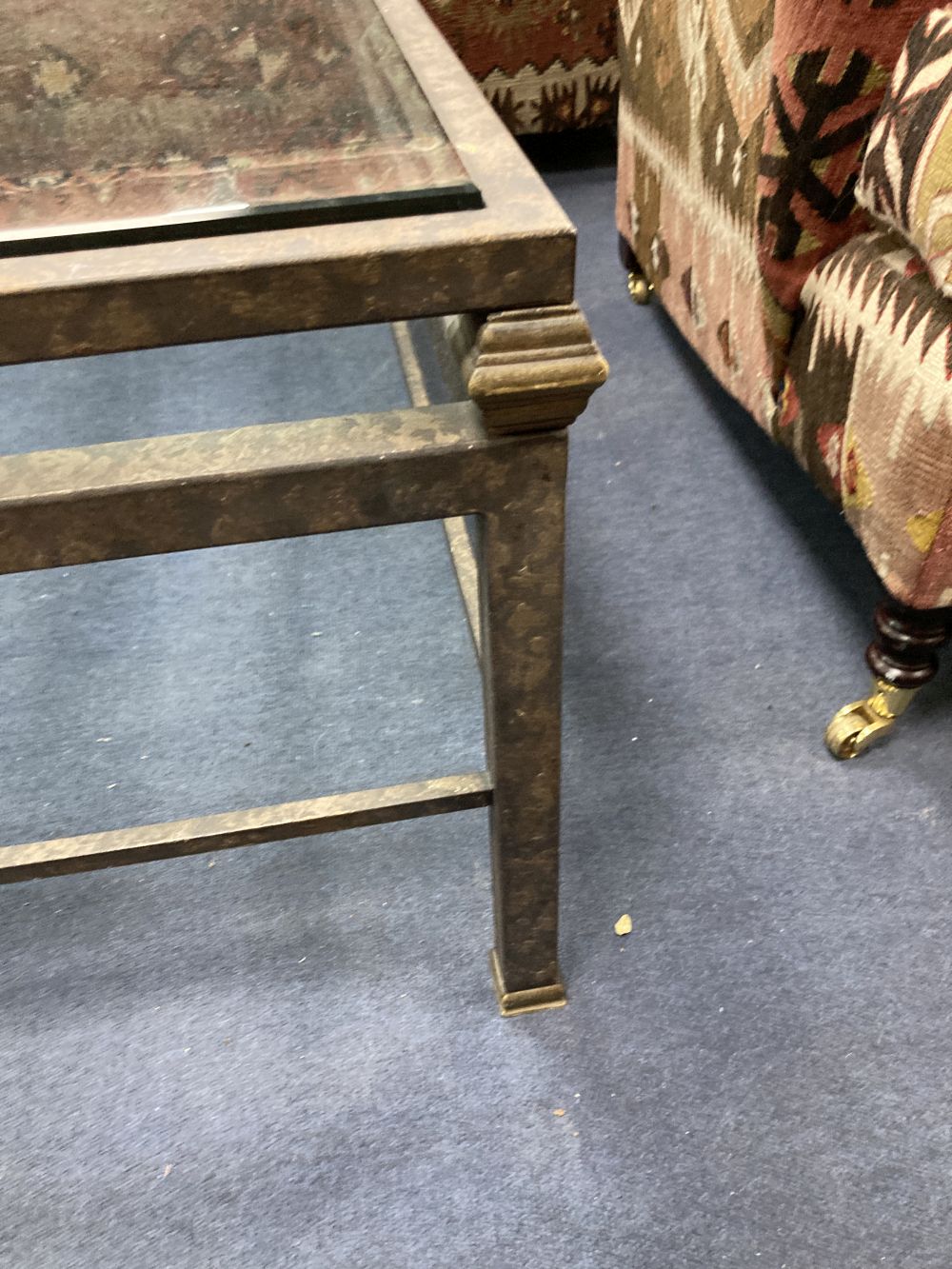 A contemporary aged metal square glass top glass coffee table, width 116cm height 47cm